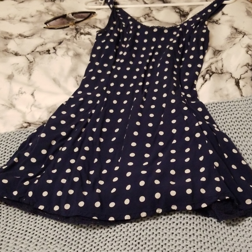 Blue blouse with white polka dots